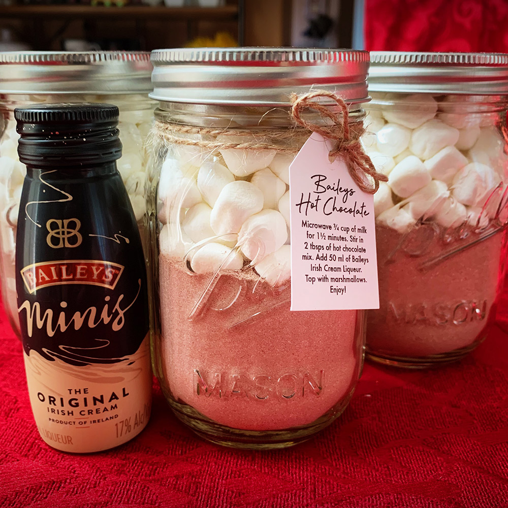 spiked hot chocolate in mason jar with baileys