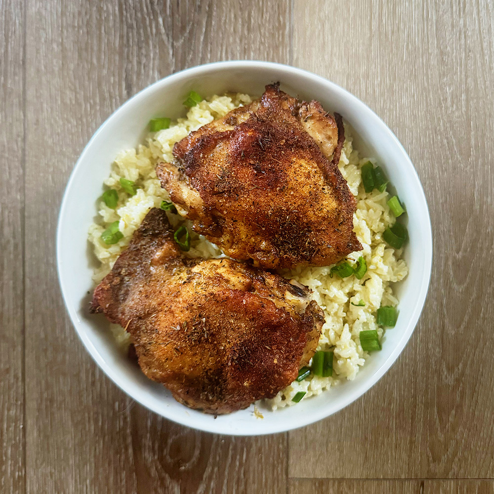 bobby flay creamed green chili rice and crispy baked chicken thighs
