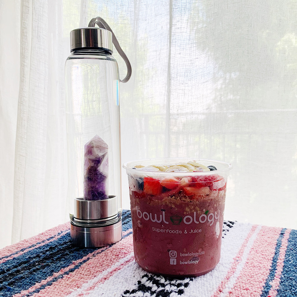 crystal water bottle and acai bowl