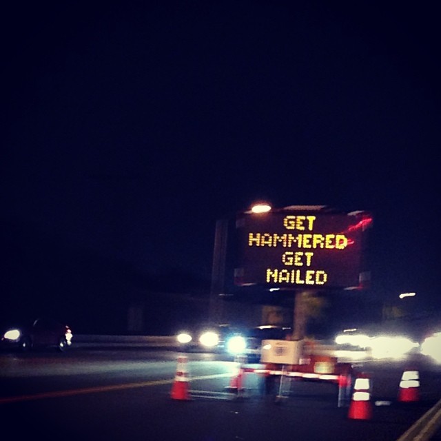 get hammered get nailed traffic sign